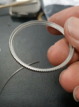 bezel ring with spring